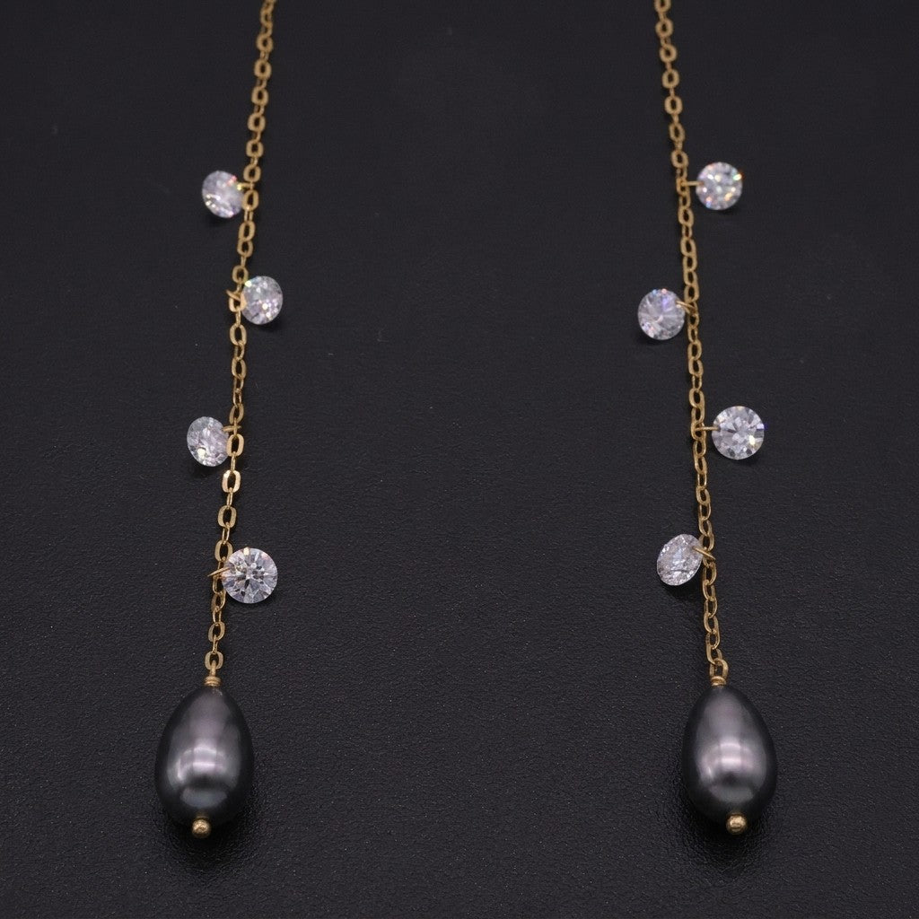 Tahitian keshi pearl and diamond threader earrings in 18k gold