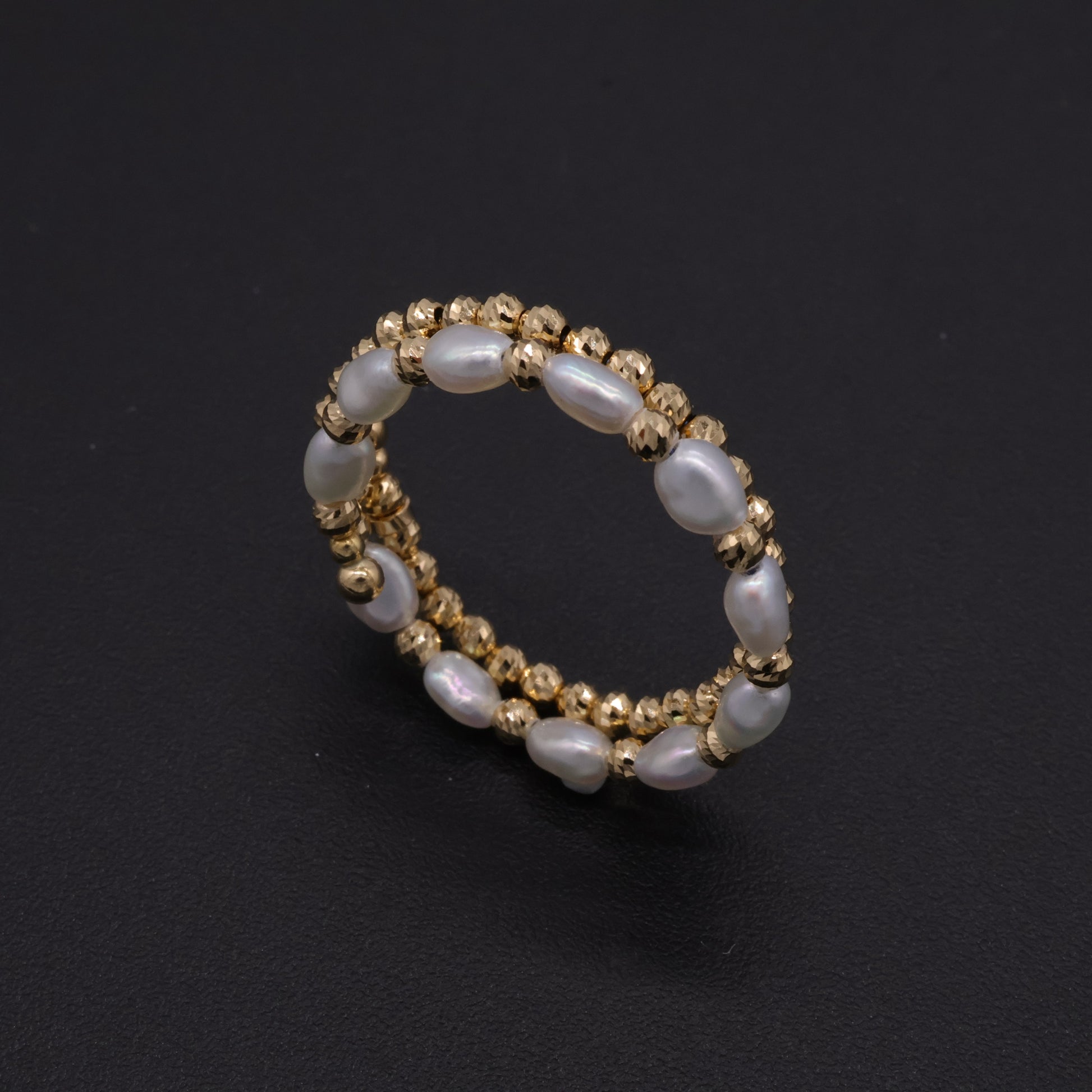 Adjustable Japanese keshi pearl memory-wire coil ring in 18k gold