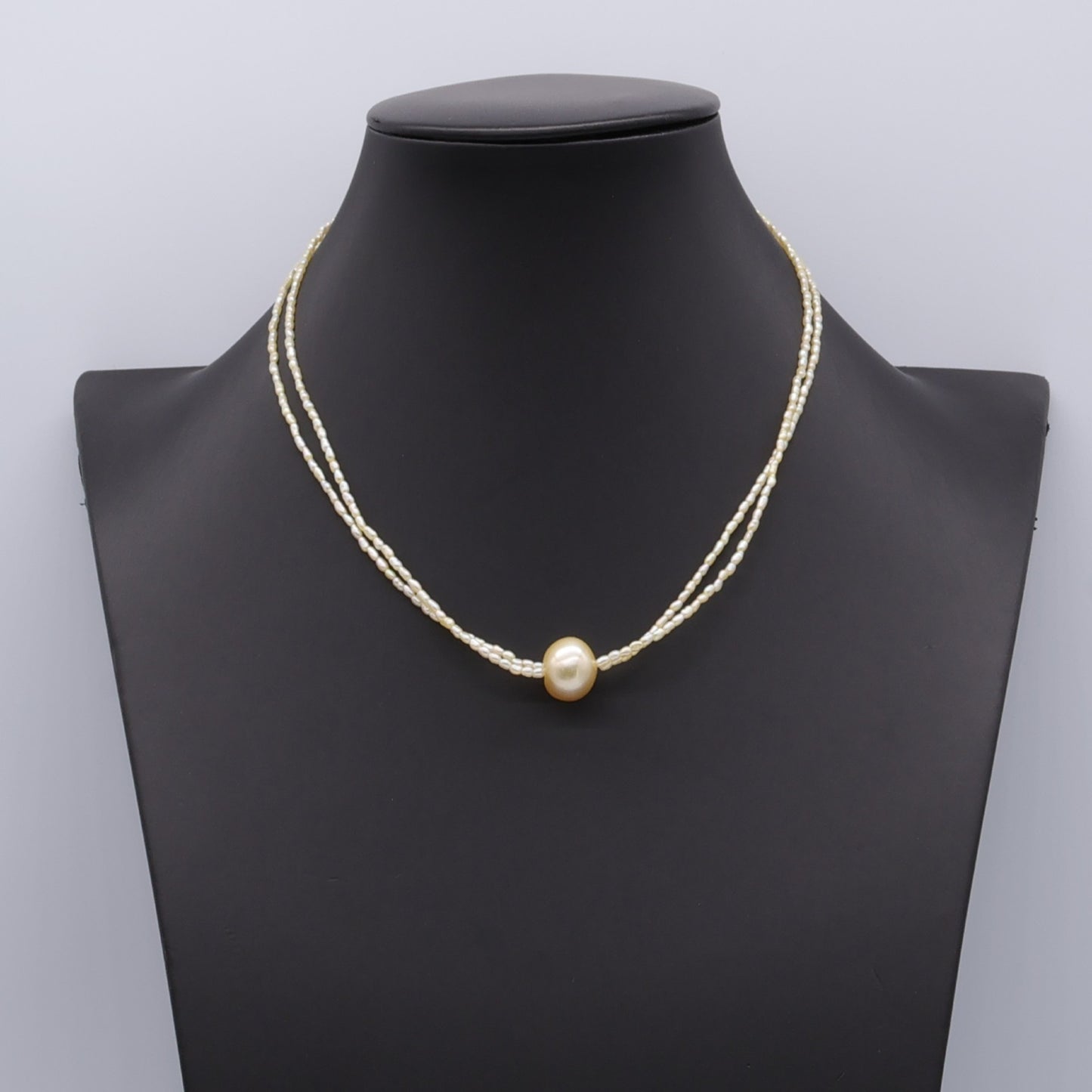 Japanese Akoya Keshi Double Strand Necklace with South Sea Center Pearl