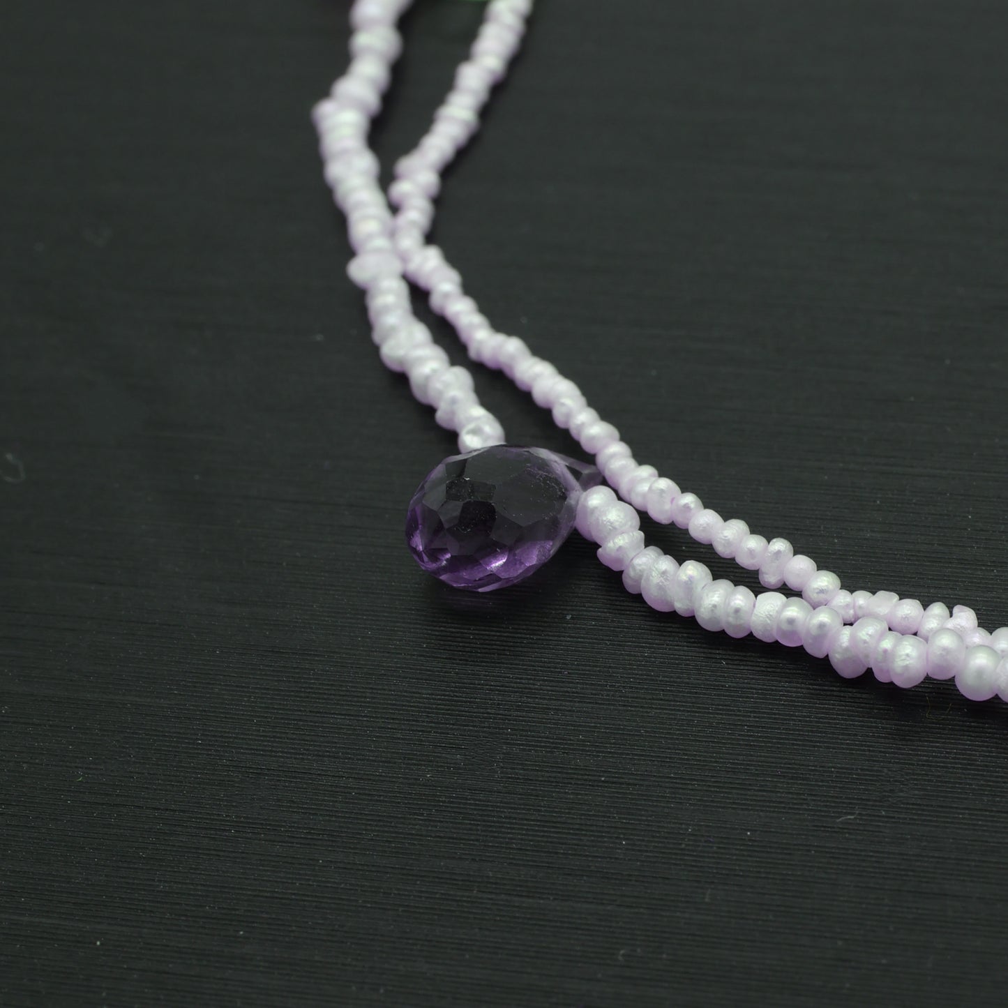 Hand-woven seed pearl bracelet with peridot, amethyst and aquamarine in sterling silver