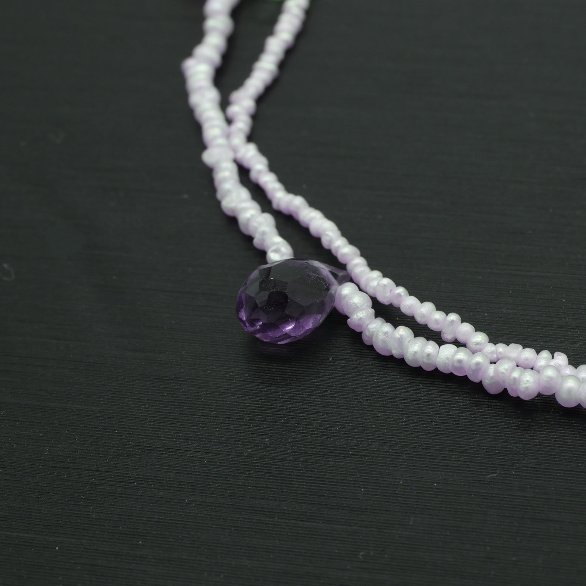 Hand-woven seed pearl bracelet with peridot, amethyst and aquamarine in sterling silver